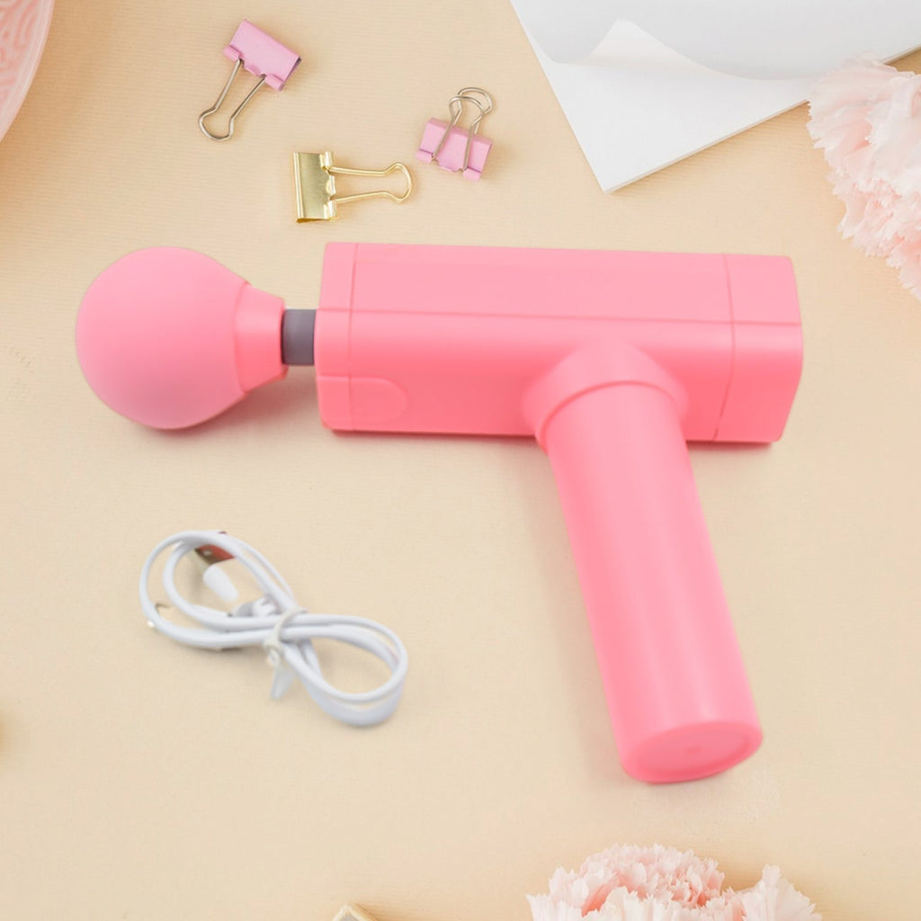 Velvet Wellness Massage Gun for deep muscle relief, highlighting its USB charging port.