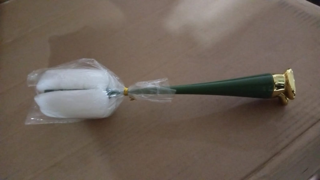 Ergonomic long handle bottle brush demonstrating its reach into a narrow-necked bottle.