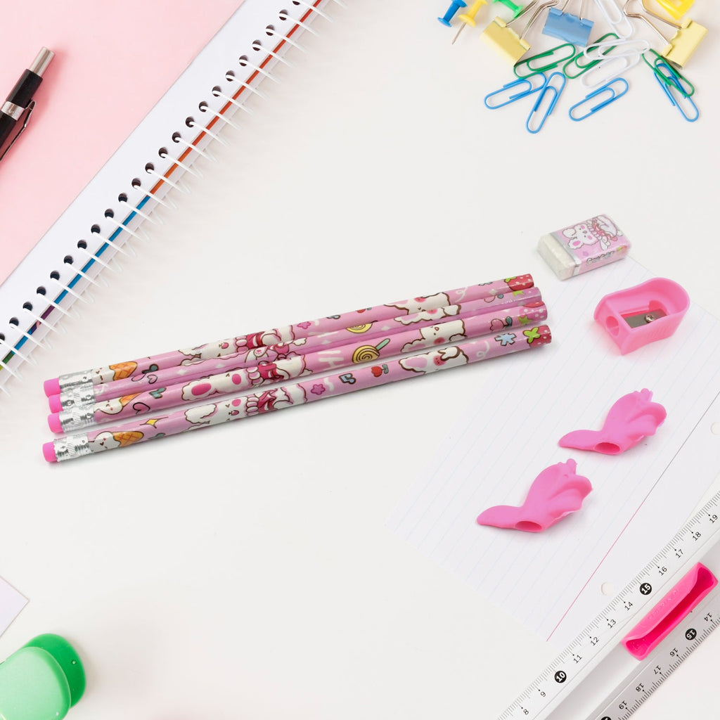 Vibrant erasers and a sharpener included in the kids' stationery kit.