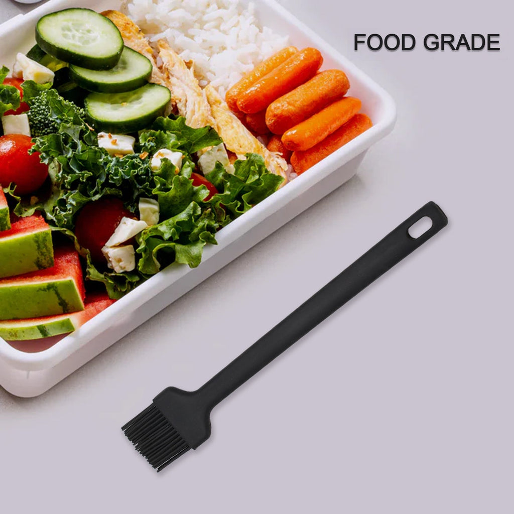 Ergonomic silicone brush with flexible bristles for even basting.