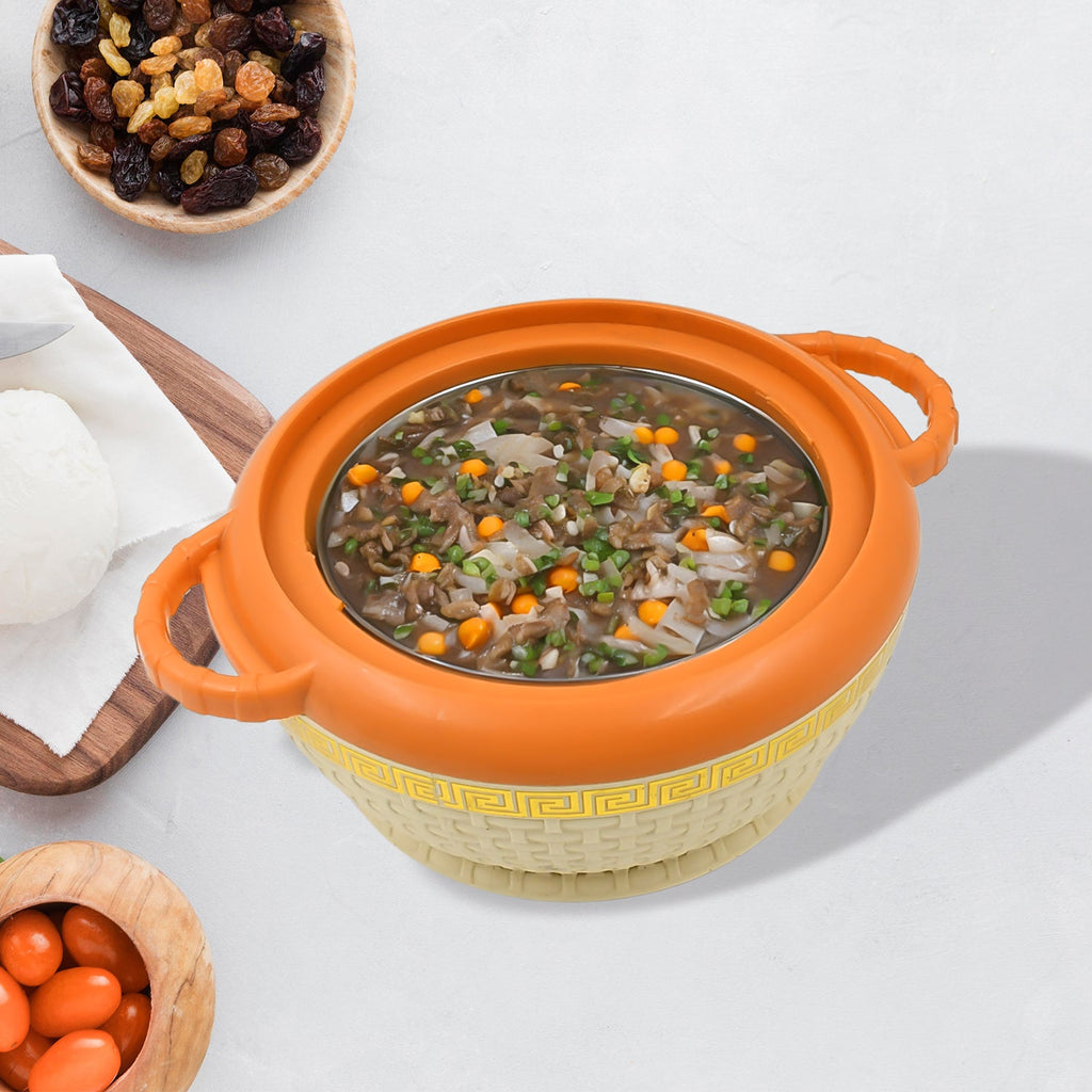 Insulated serving casserole with lid and ergonomic handles.