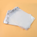 Self-adhesive transparent courier polybag showcasing secure packaging