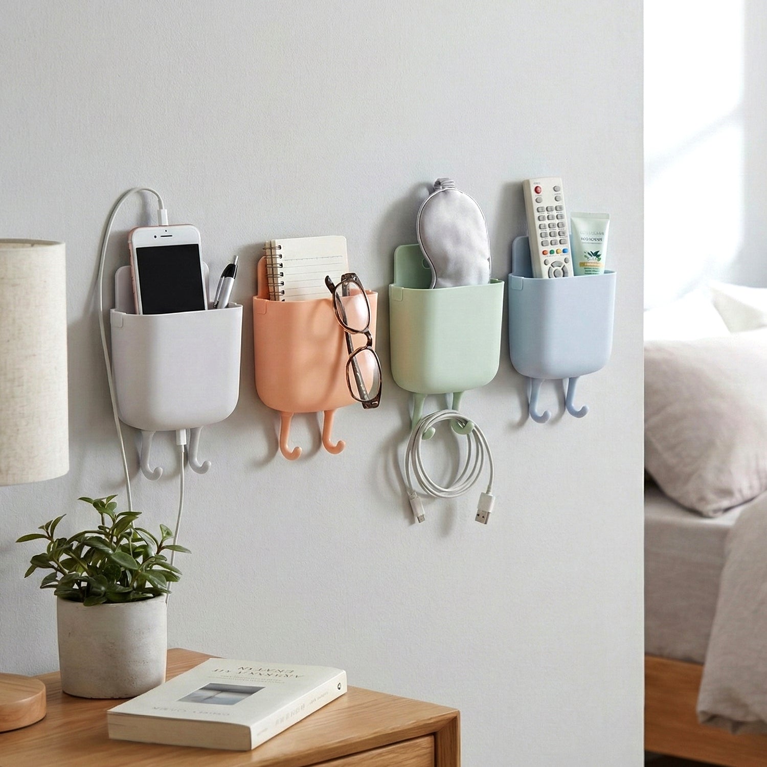 Plastic wall mounted mobile charging holder set of 4 pieces for smartphones and accessories