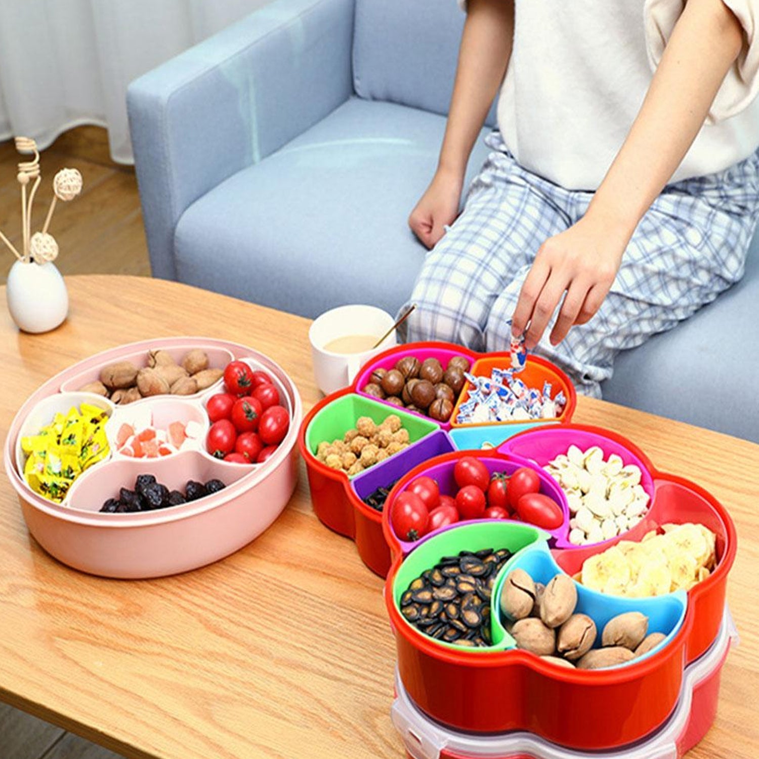 Clear 5 compartment snack box filled with various dry fruits and nuts.
