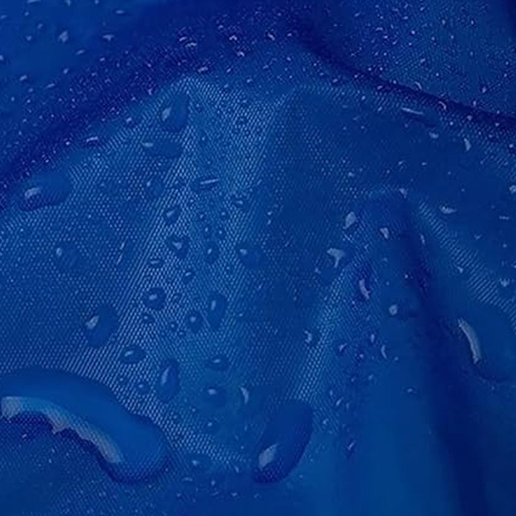 A close-up of a blue waterproof fabric with small water droplets beading on its surface.