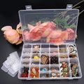 Clear plastic organizer box with 36 adjustable grids for versatile storage.