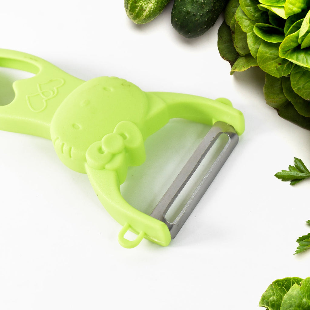 Peeling different fruits and vegetables with versatile kitchen peelers