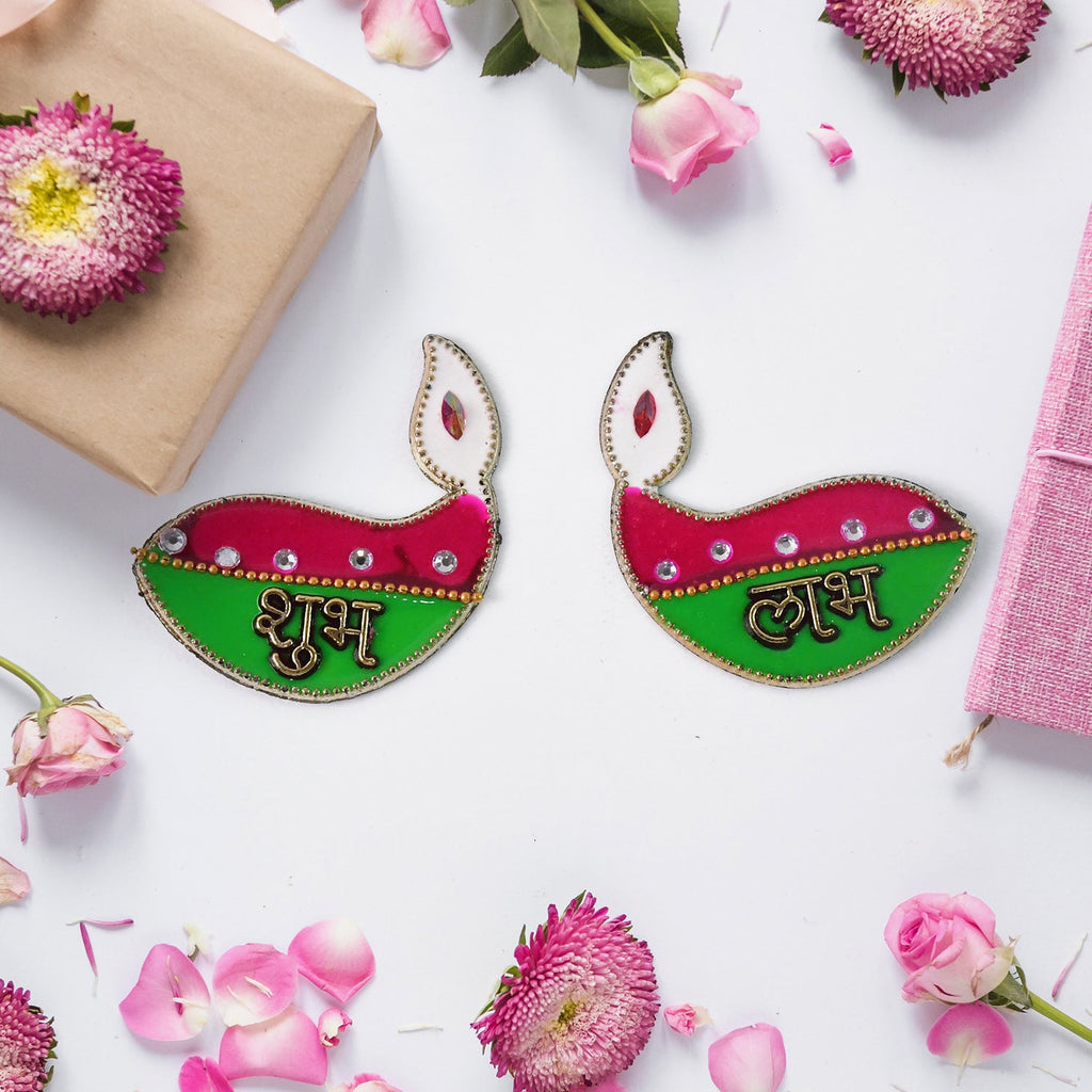Shubh Labh diya shaped wall hangings displayed during Diwali festival decoration