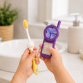 Kids toothbrush set with fan toy, featuring cartoon character design