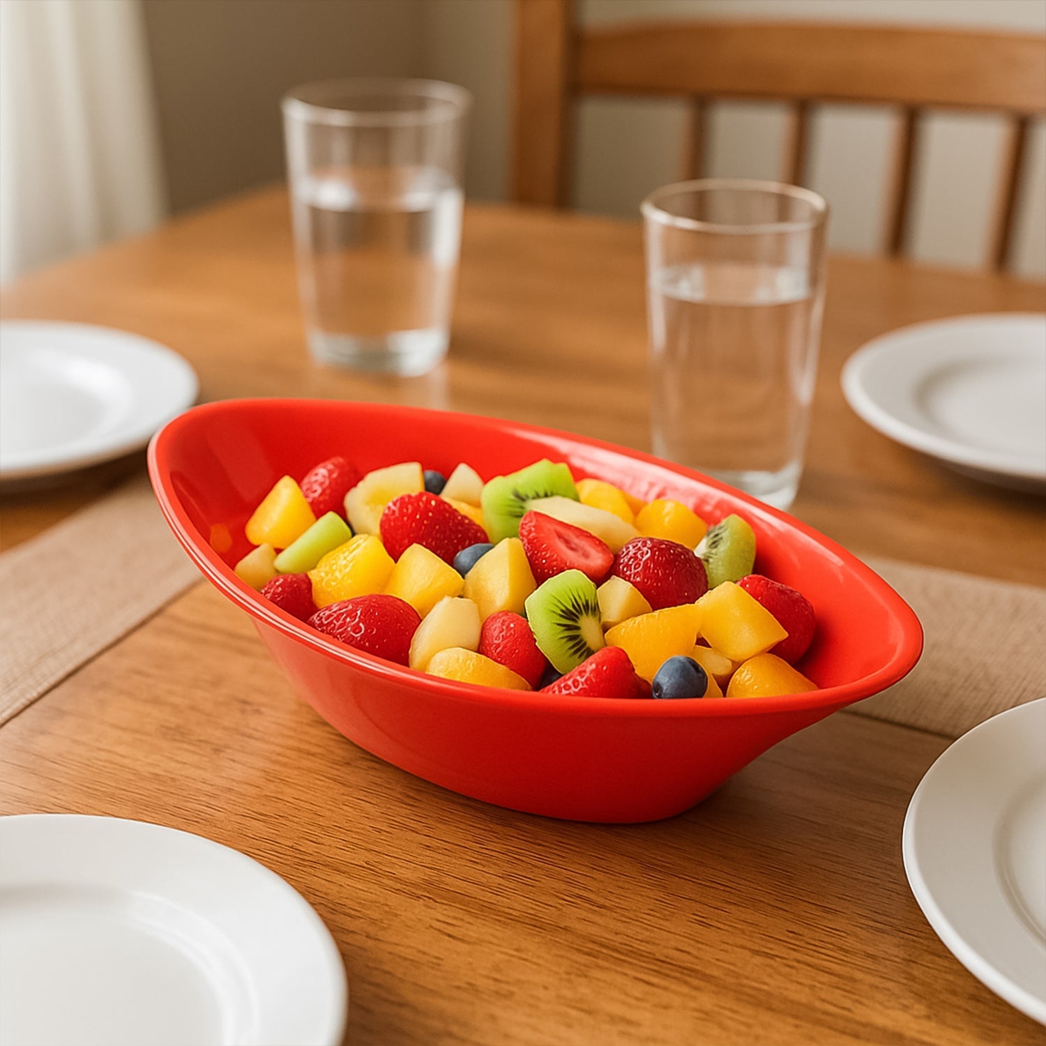 Close-up of smooth, red plastic Marin serving bowl surface