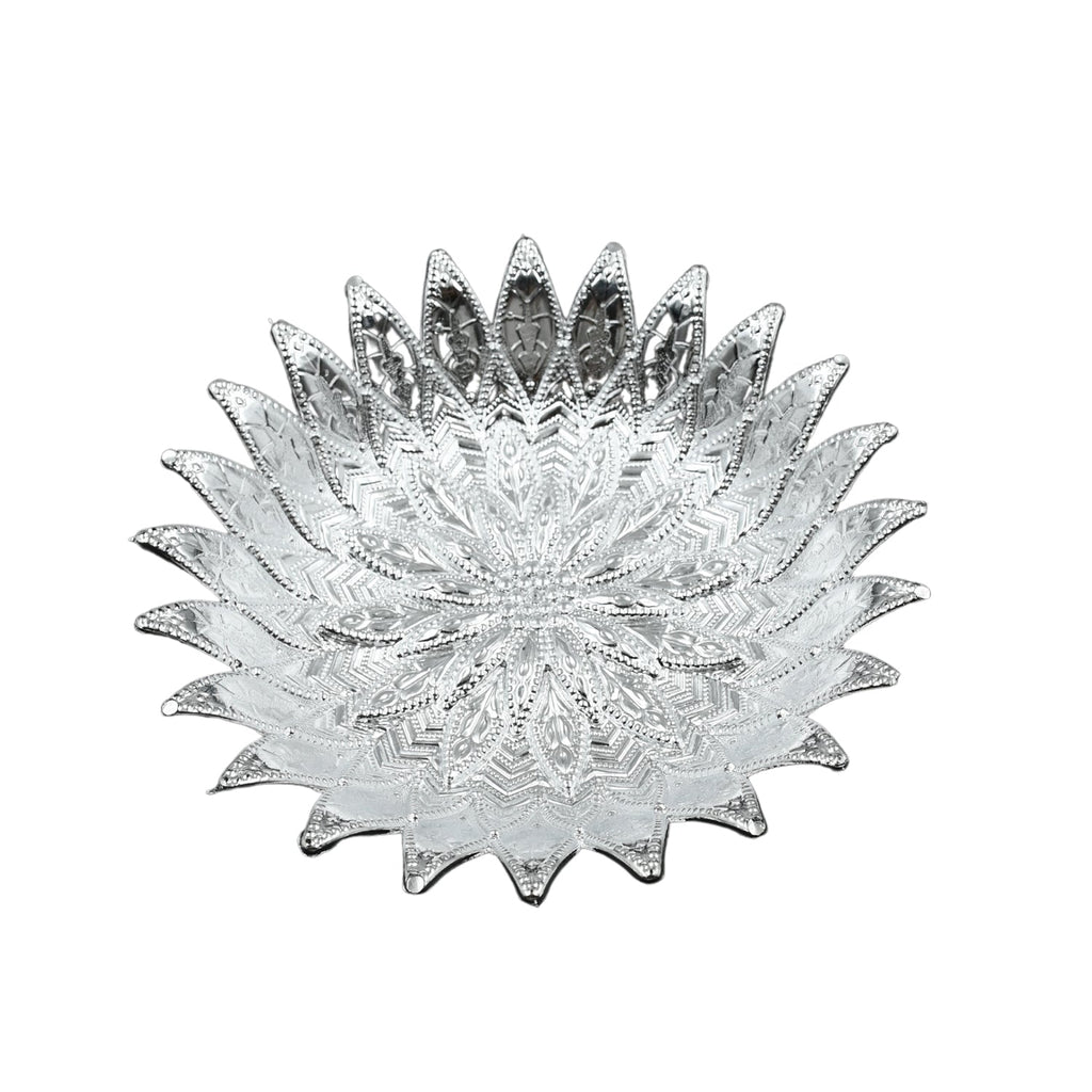 Elegant plastic serving tray with a silver finish, viewed from a top angle on a table.