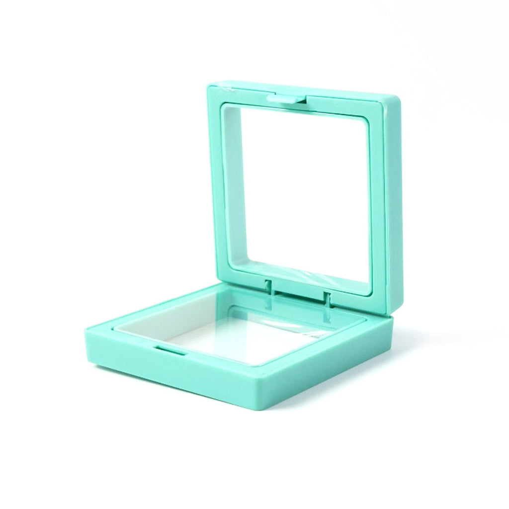 Jewellery Display Box holding earrings and rings with clear membranes