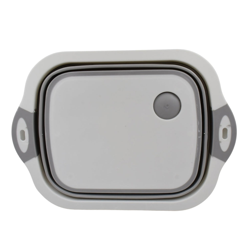 Versatile kitchen tool acting as both a cutting surface and a storage basket.