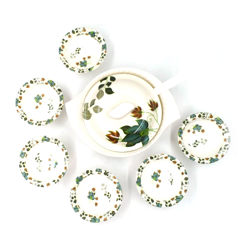 Modern 9-piece cutlery set ready for serving sweet dishes.