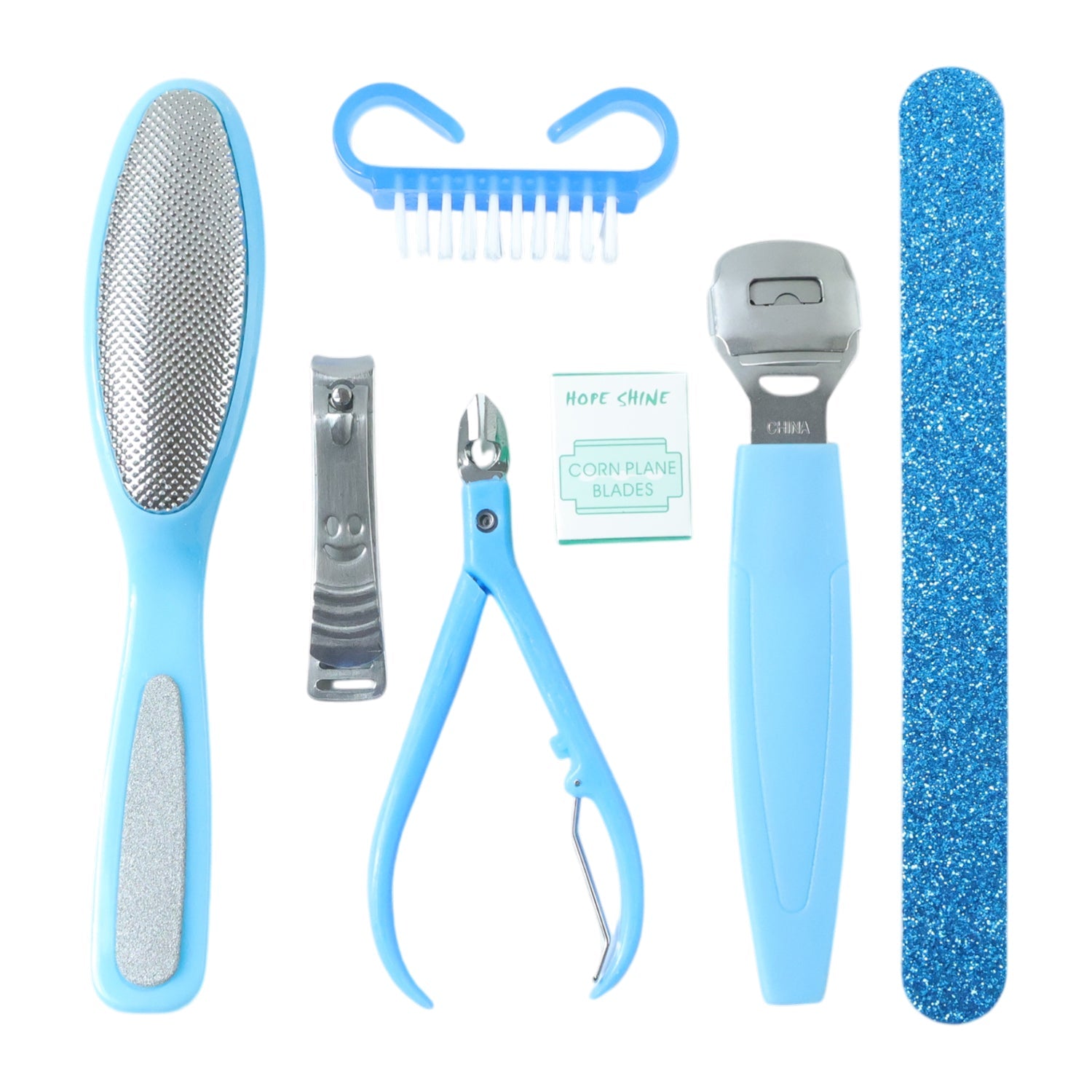Nail care kit including foot file, corn cutter, and cleaning brush