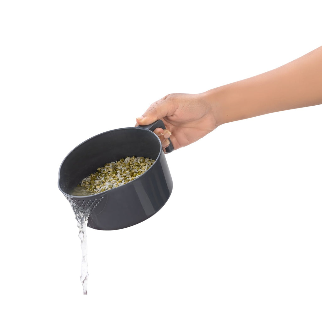Complete view of the versatile rice and grain dispenser filled with various dry foods.