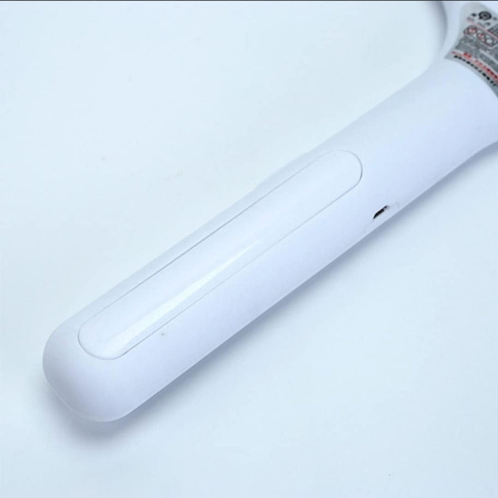A close-up view of the smooth, white handle of the mosquito killer racket against a plain white background.