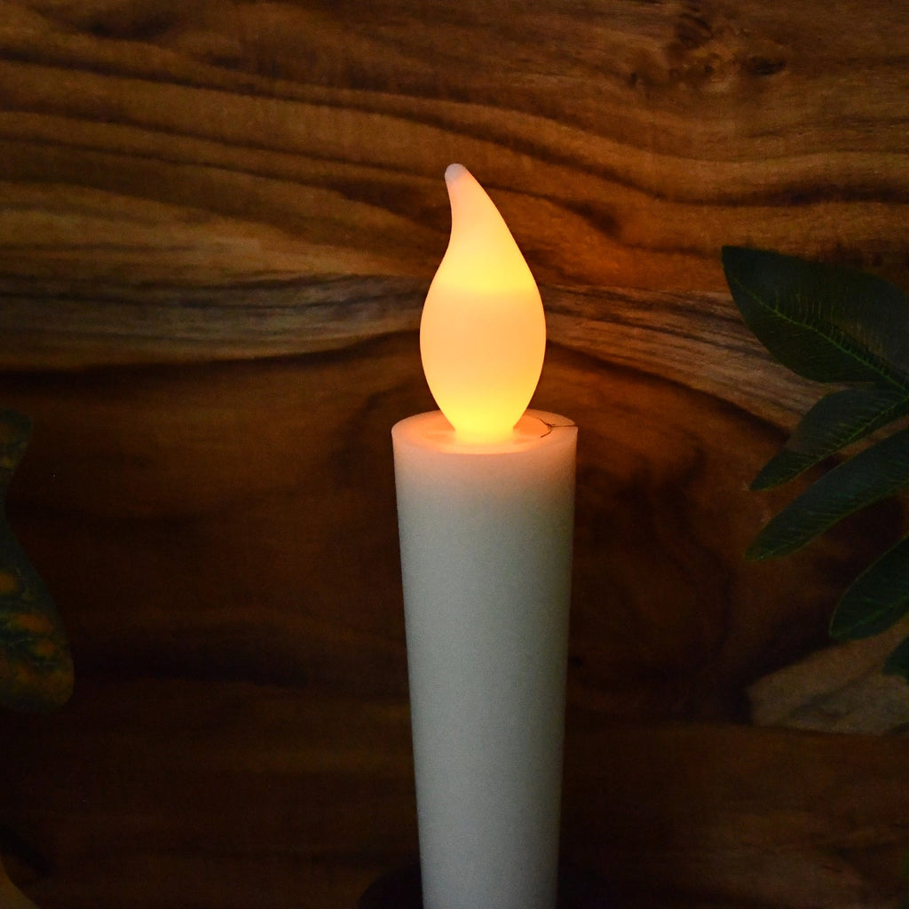 Decorative LED flameless candle lighting up indoor spaces softly