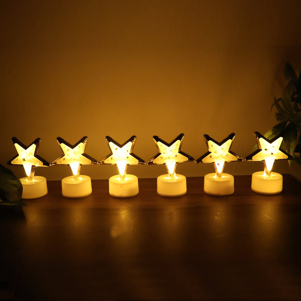 Battery operated star shaped LED candle with easy on/off switch at base
