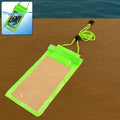 A bright green waterproof mobile pouch with a clear front is displayed on a wooden surface, with a small inset showing a