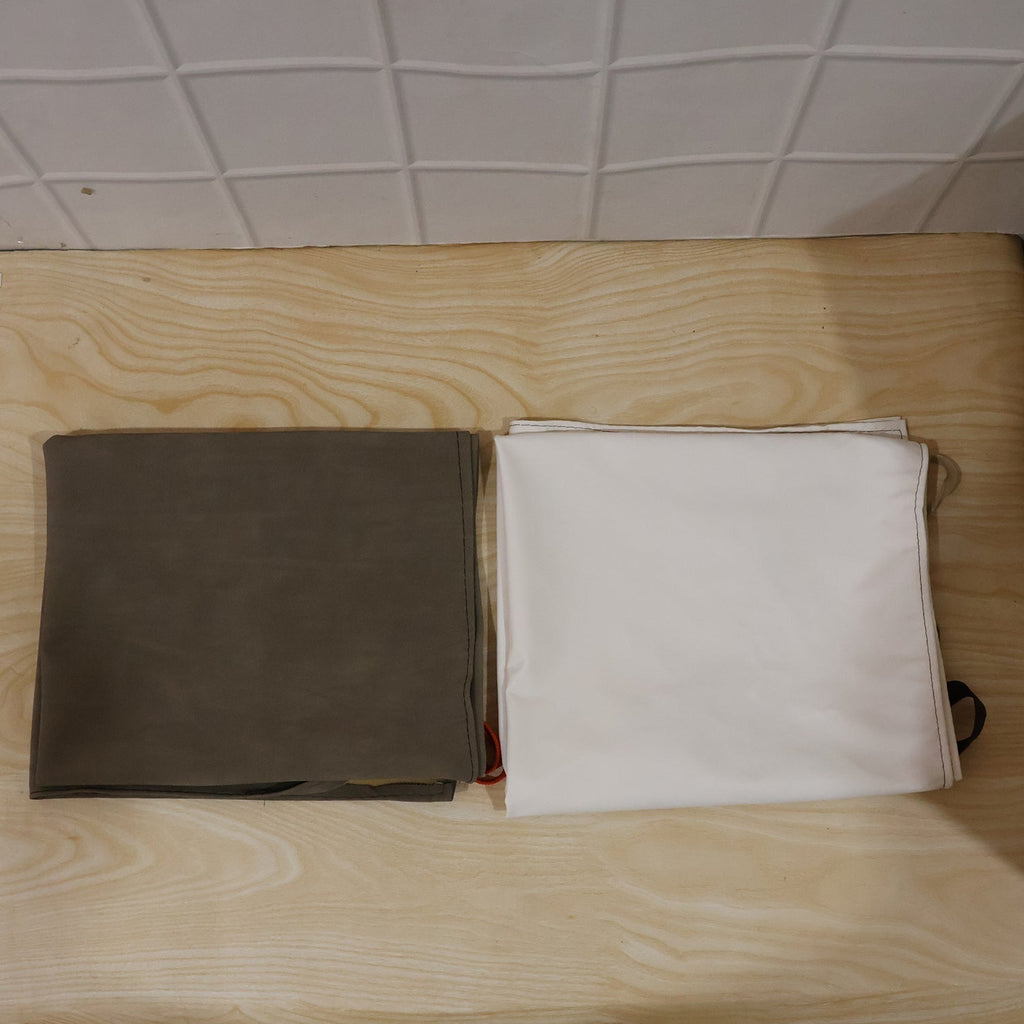 The versatile kitchen apron neatly packaged, ready for daily home or commercial use.