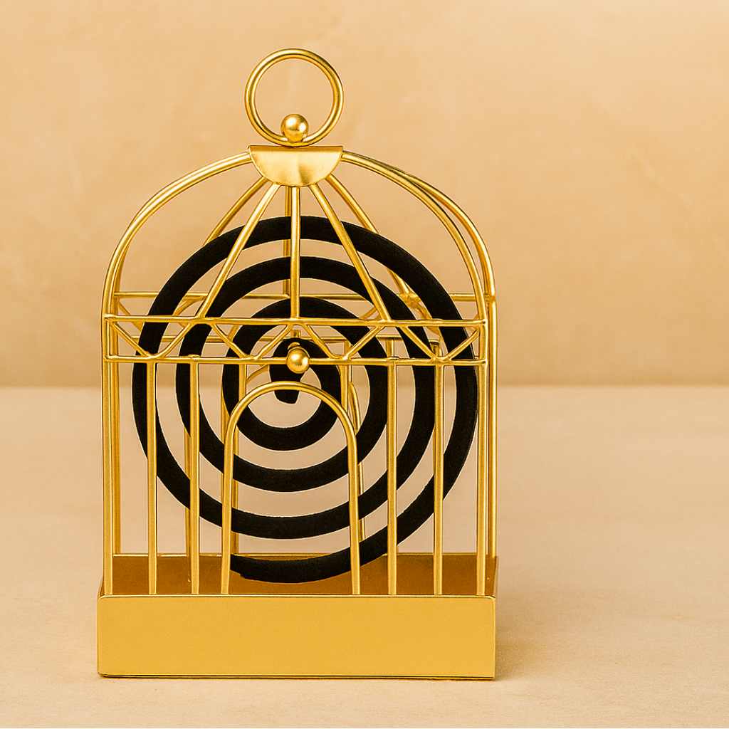 A gold metal birdcage-style holder with a black mosquito coil is centered against a warm beige background.