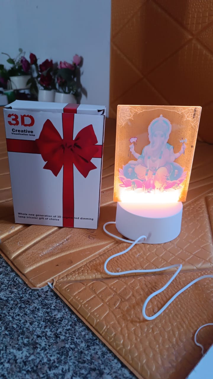 Lit 3D Lord Ganesh Frame adding spiritual ambiance to home interior