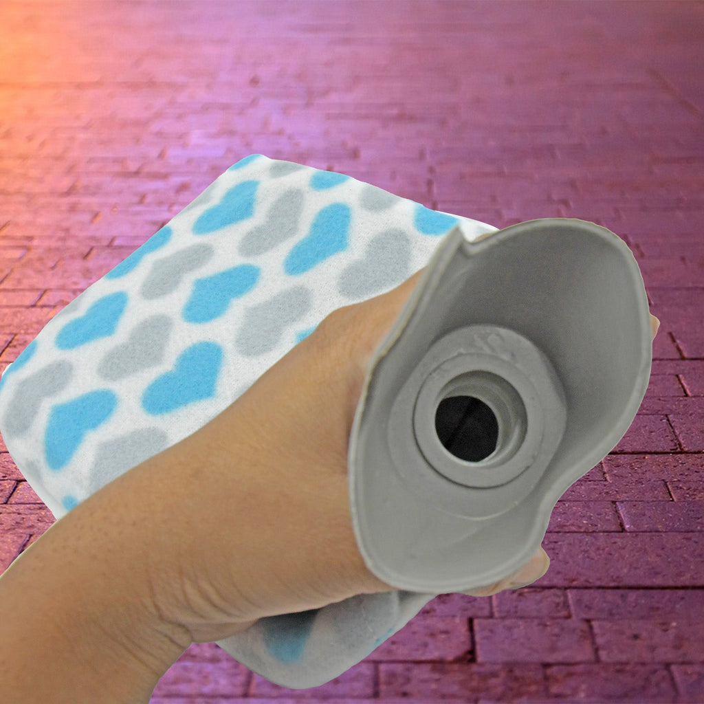 Close-up of the hot water bag's secure cap and soft, removable cover.