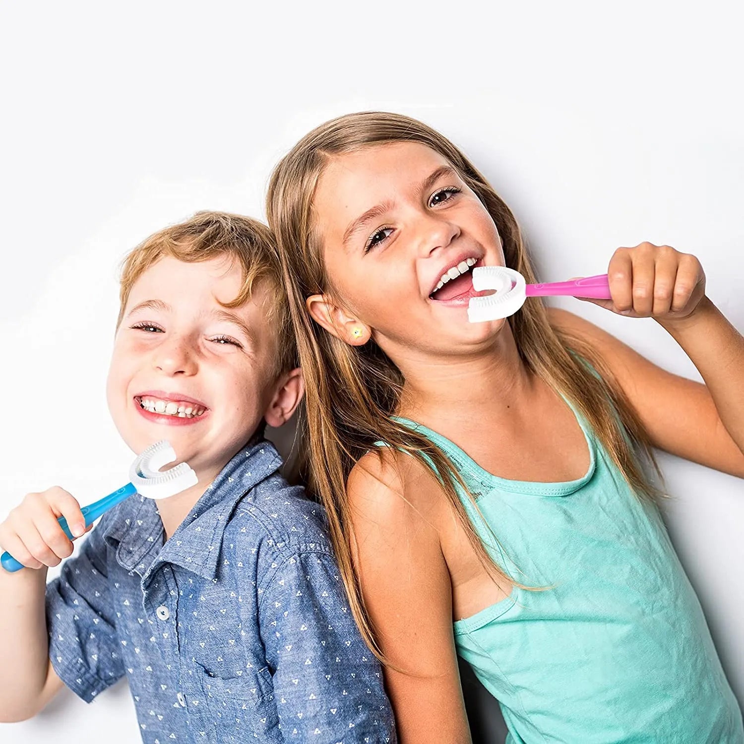 Detail of the flexible silicone bristles on the U-shaped toothbrush.