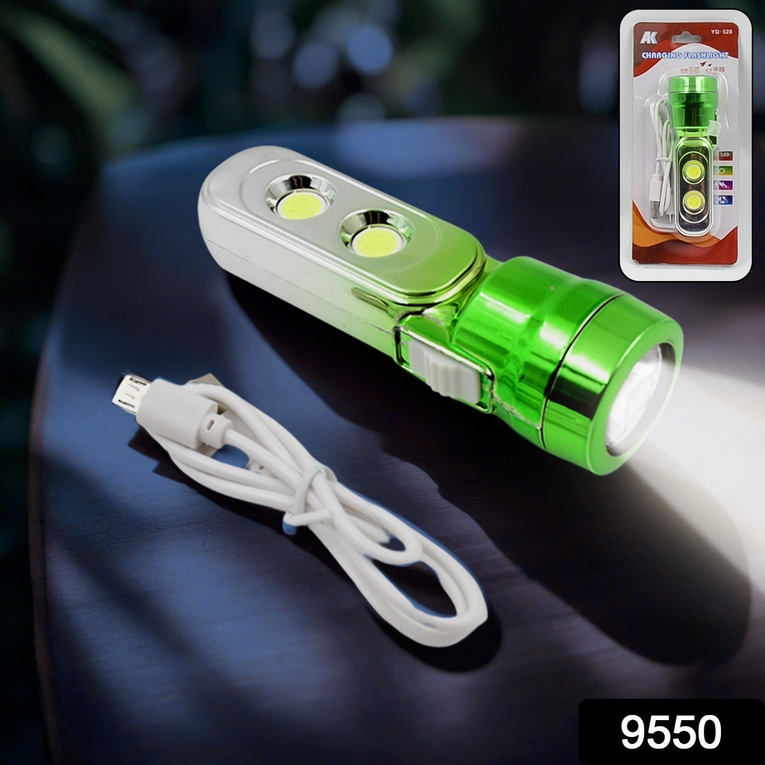 Hand holding a bright LED flashlight, illuminating a dark area.