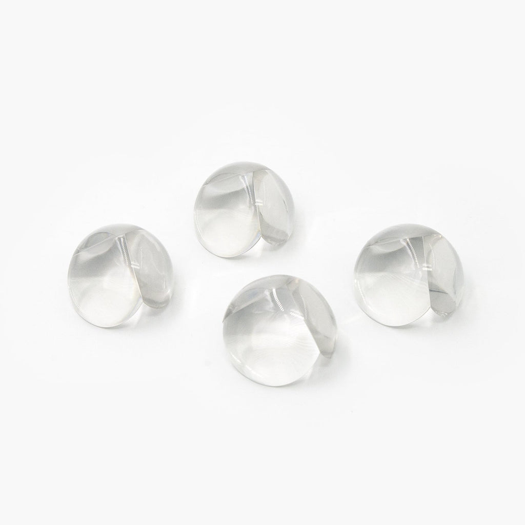 Effective clear corner protectors on a table edge, pack of 4.