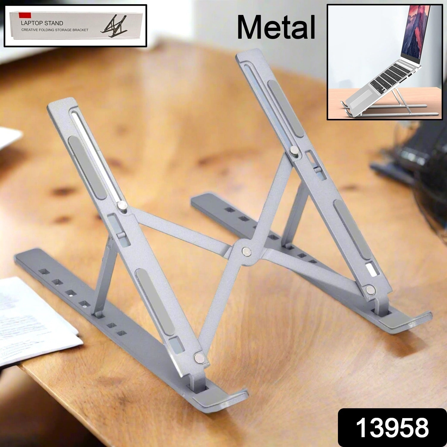 The foldable metal portable laptop stand is displayed in its compact, travel-friendly form.
