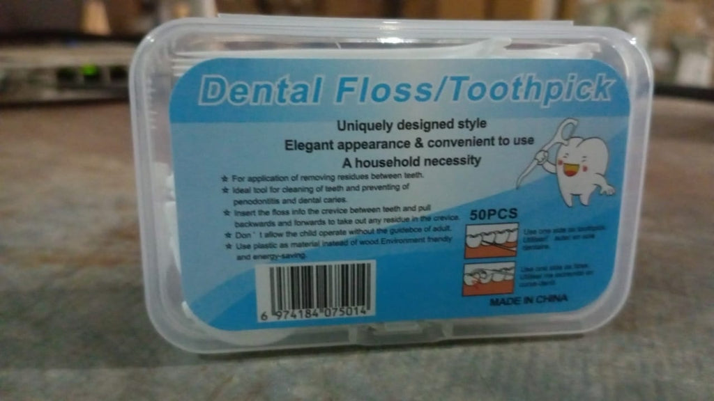 Multiple MintGuard Portable Dental Floss Picks displayed, highlighting their travel-friendly design.