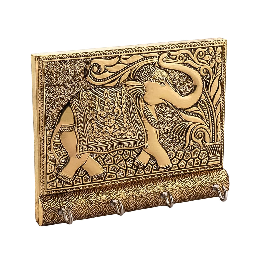 Detailed shot showcasing the antique gold elephant motif on the decorative key holder.
