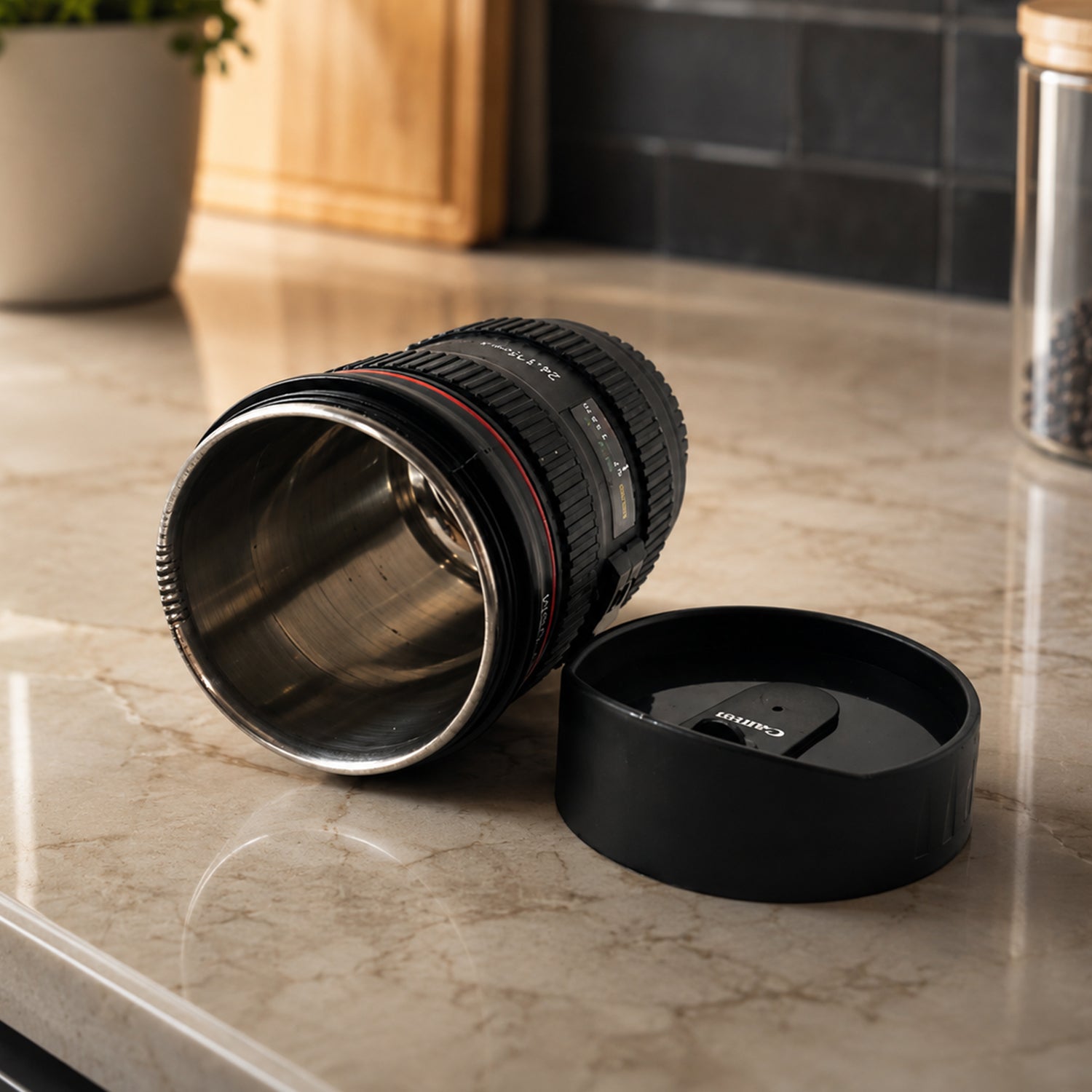 Top down view of the camera lens coffee mug, highlighting the detailed lid.