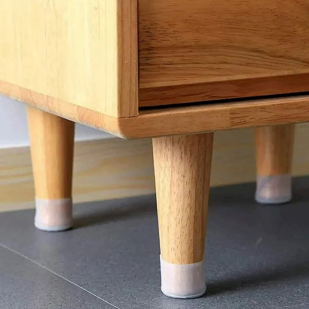Silicone furniture pads fitted on chair legs for floor protection
