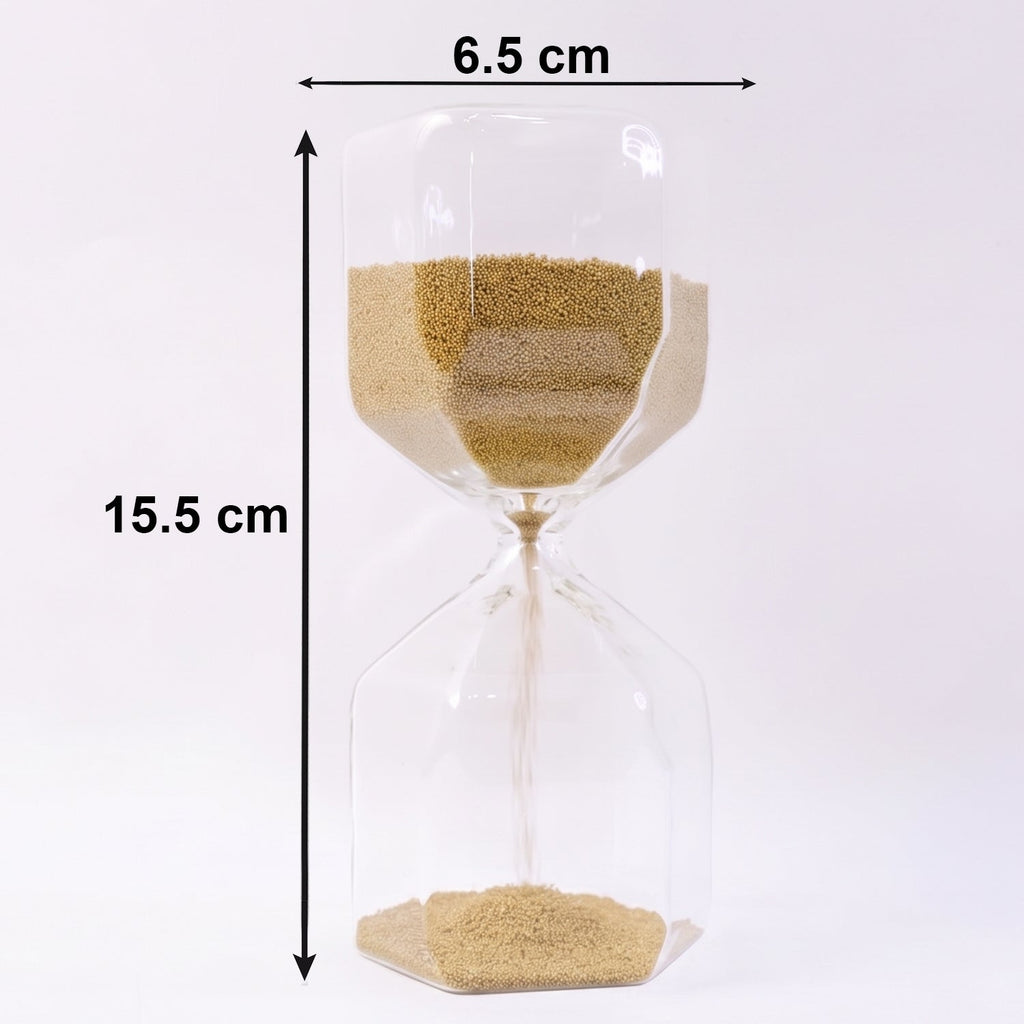 Smooth yellow sand flowing inside an elegant glass hourglass timer.
