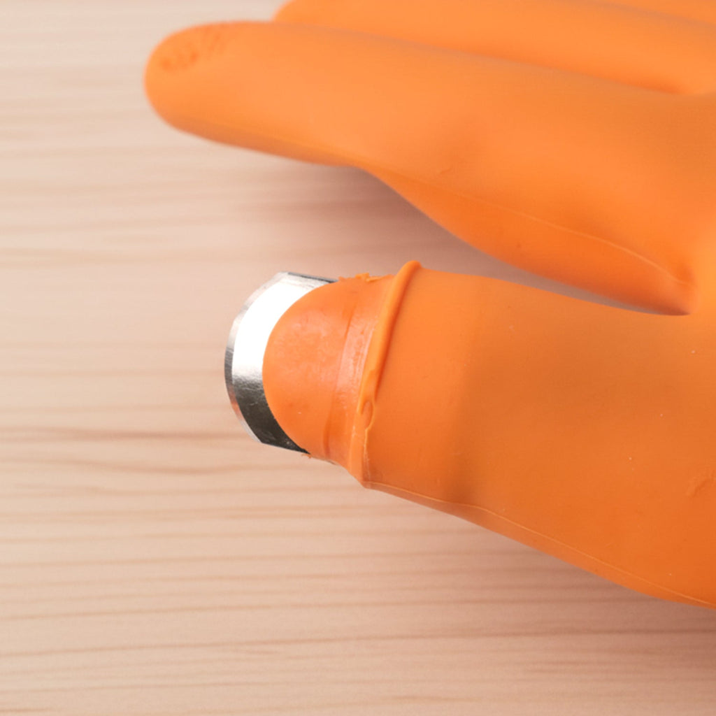 Silicone gloves protecting hands during food preparation
