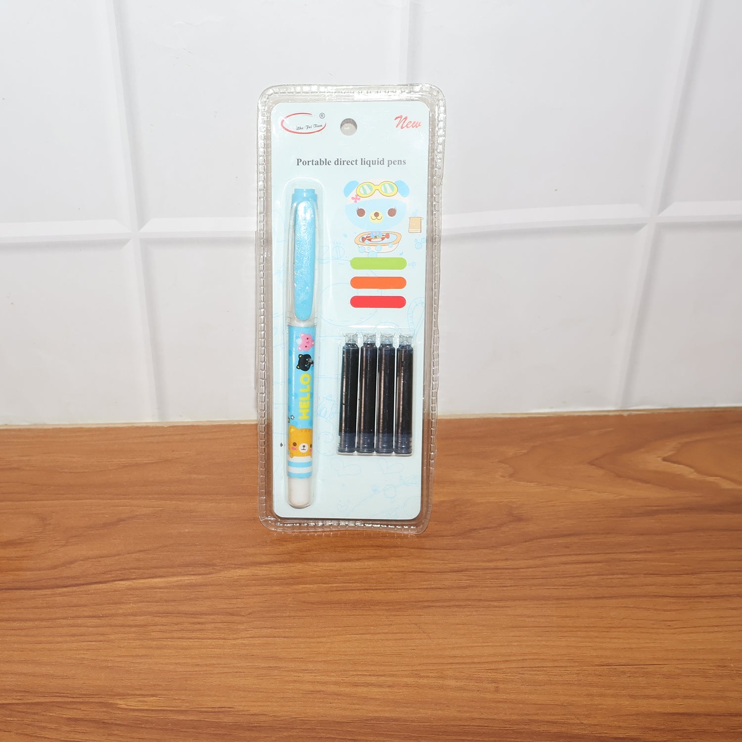 Set of cartoon themed writing pens with refill cartridges