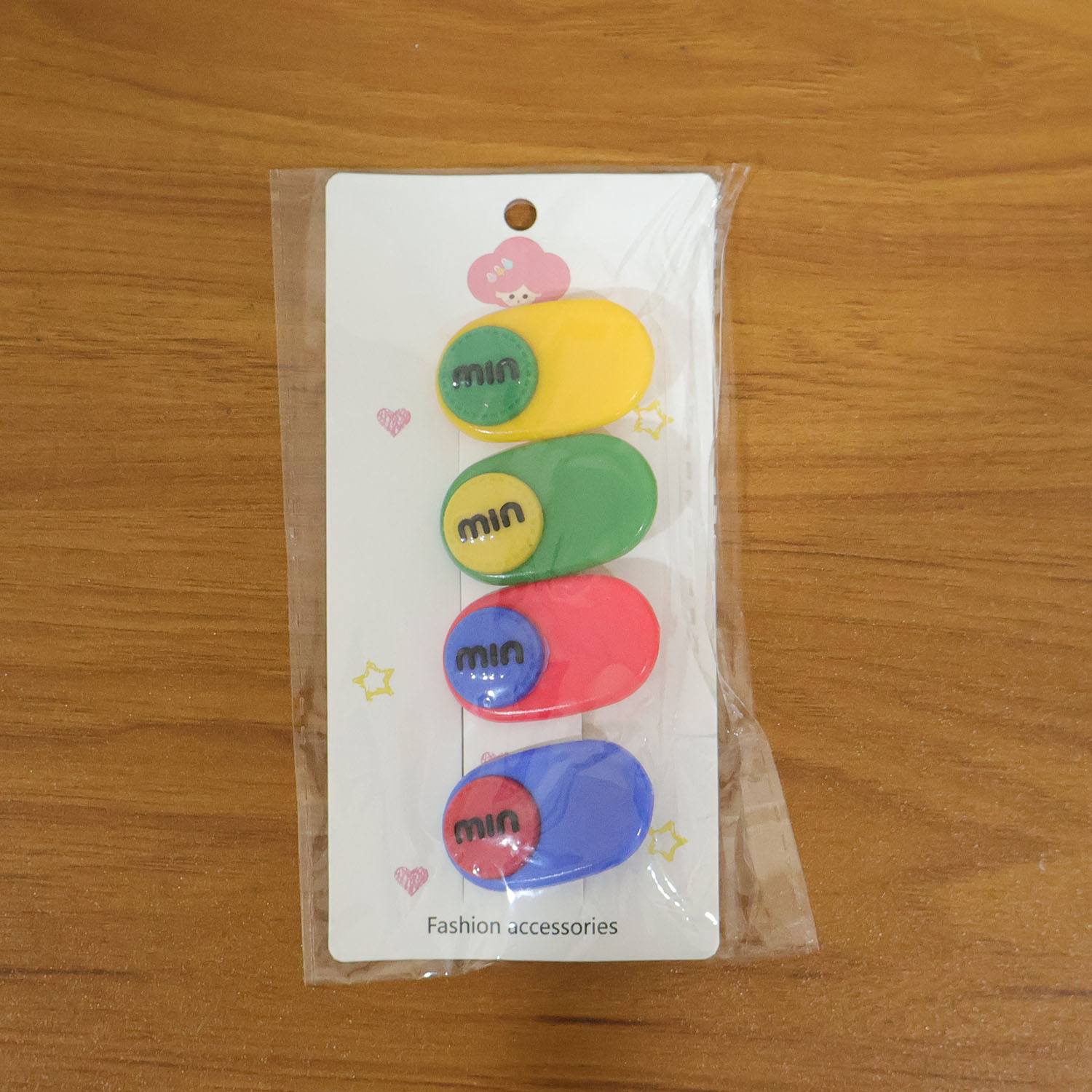 Woman applying a decorative text accent hair clip for effortless styling