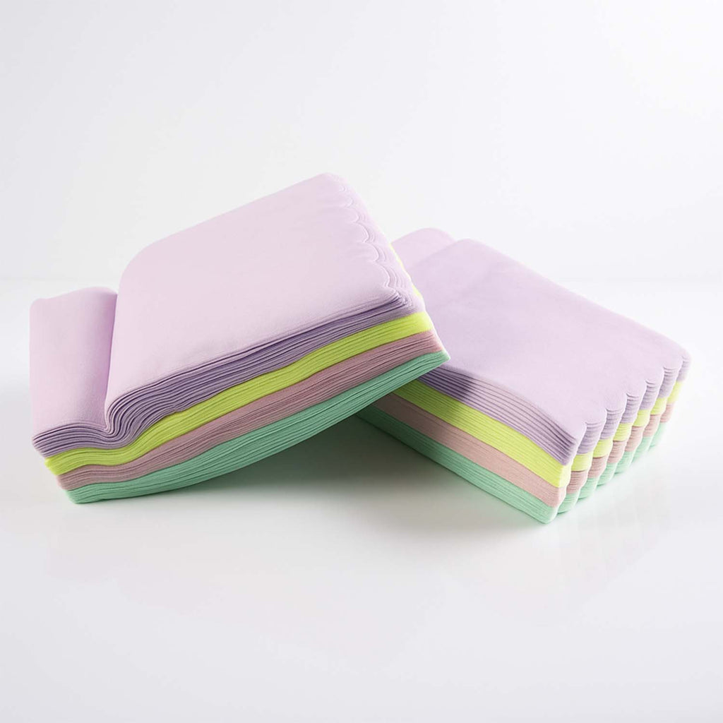 Roll of multicolor baking parchment paper sheets for cooking and baking.