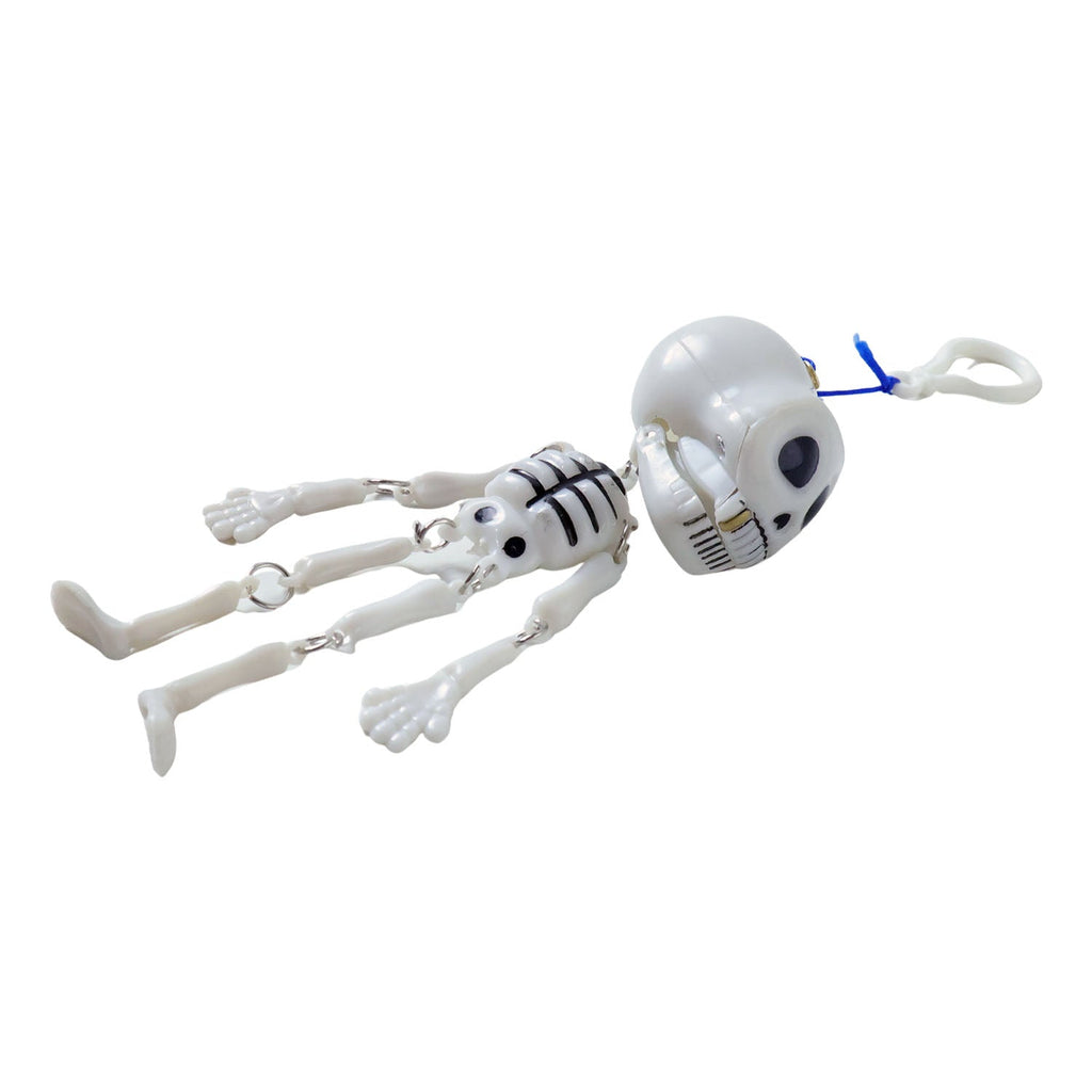 Skeleton doll hanging keychain clipped onto backpack zipper