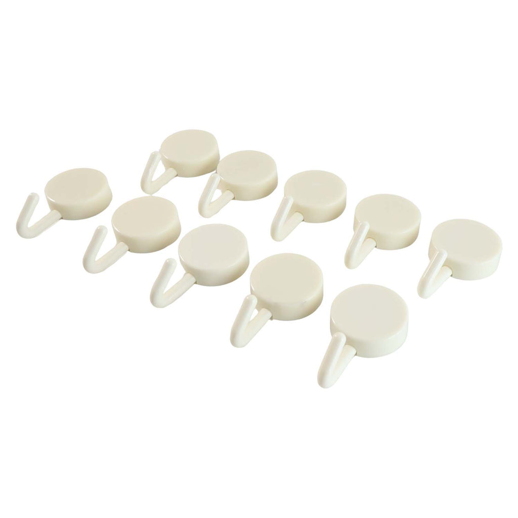 Adhesive round wall hooks organizing kitchen tools effectively