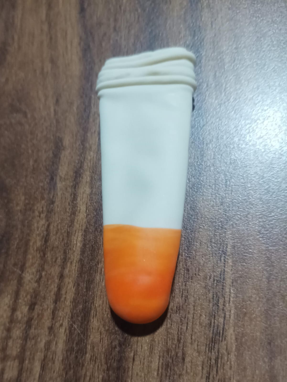 Detailed view of a silicone finger cap providing cushioning